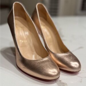 Christian Louboutin Metal Pink FiFi 100 pumps Rose gold
SZ 38.5